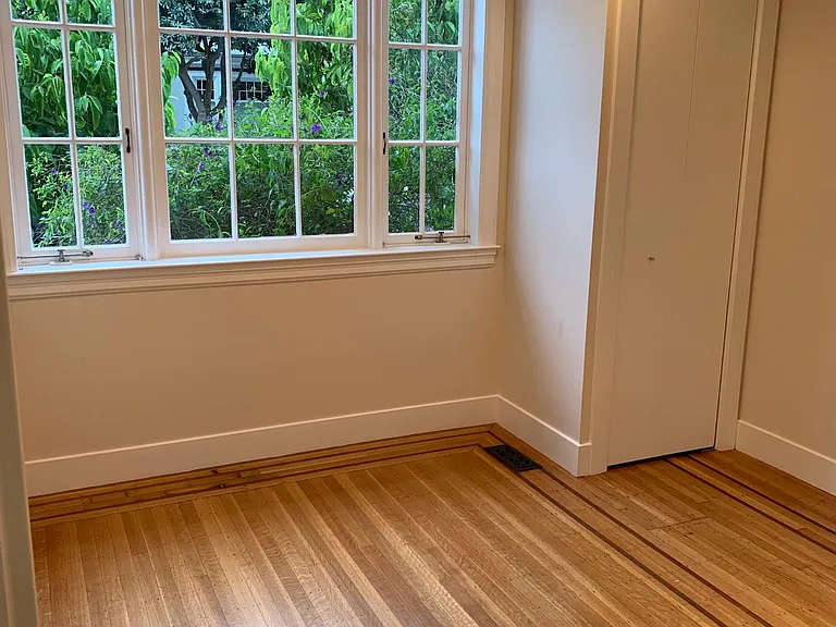 Unfurnished view of bedroom 1, has 2 closets
