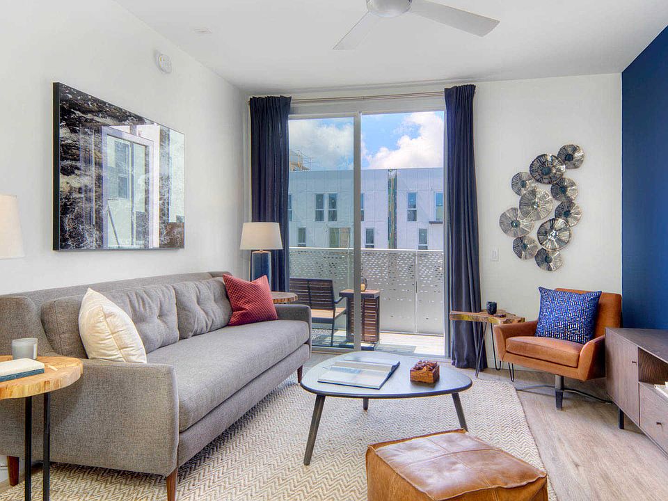 Living Room with Hard Surface Flooring and Balcony